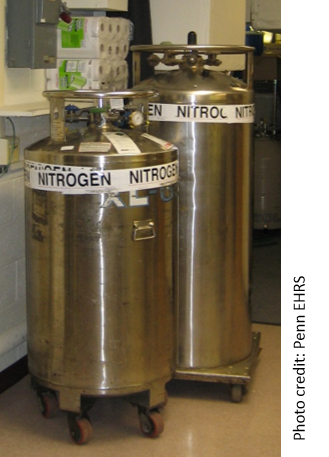 Two sizes of large stainless steel canisters on wheels 